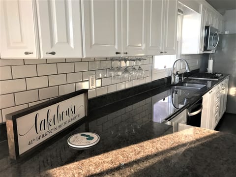 Kitchen stocked with plenty of wine glasses!
