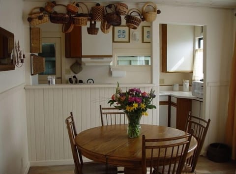 Dining room and kitchen look out onto front garden