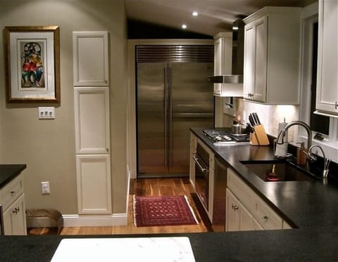 Chef's kitchen-staninless steel, gas range, stone counters. Completely equipped.