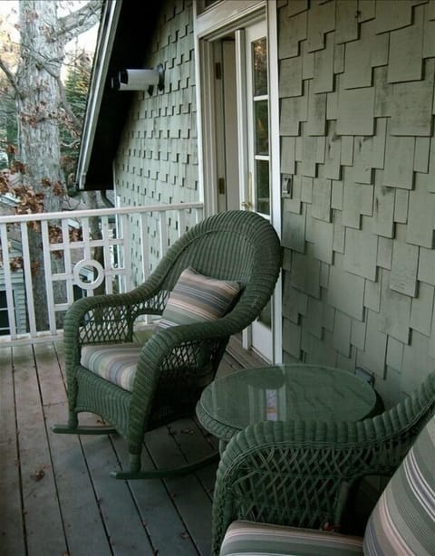 Private second floor covered porch off master bedroom. Perfect for quiet time.