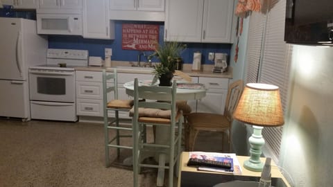 stylish high top table with comfortable seating.