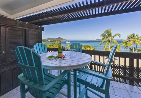 Sunlit patio with panoramic ocean and mountain views