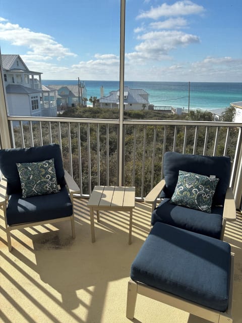 Screen porch on master level with amazing beach view!