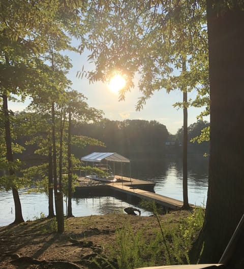Welcome to the lake! Sunset over private, covered dock.