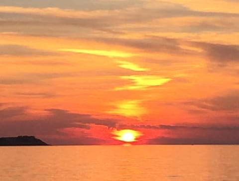 Beautiful sunsets from our deck or the beach