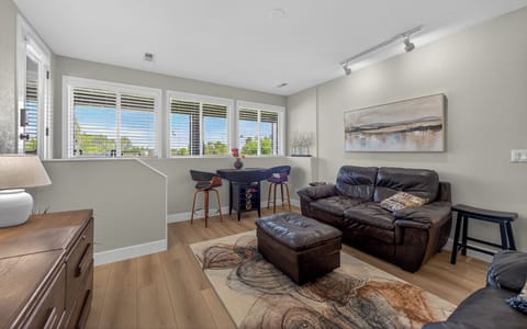 Wall to wall windows, with fresh  new look to floor and accessories.  
