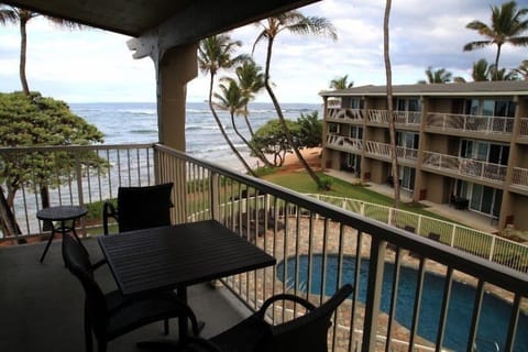 From the lanai looking out to the ocean past the pool