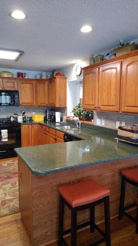 Island with bar stools