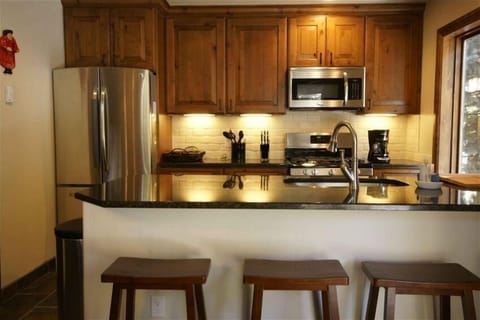 Kitchen with counter seating.