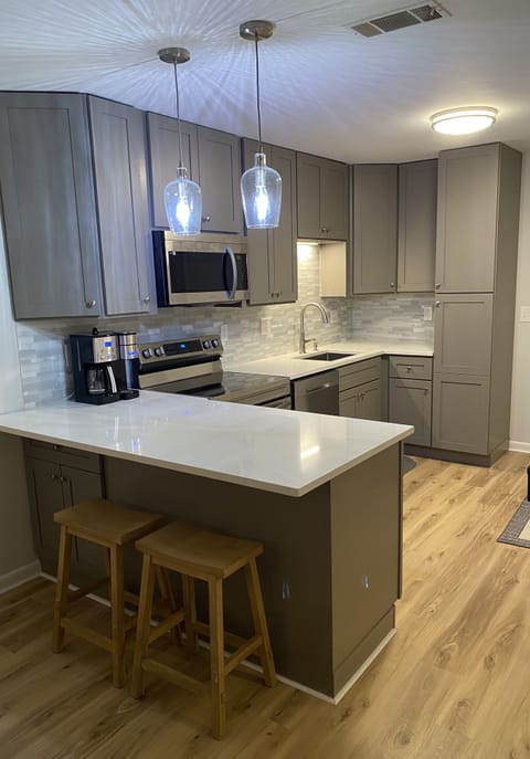 Remodeled in 2023! Fully stocked kitchen with stainless steel appliances.