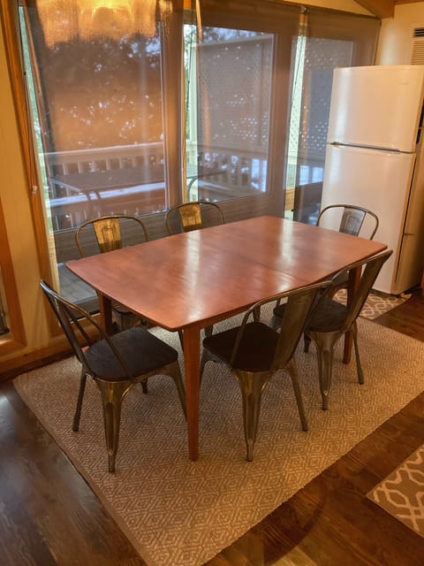 Kitchen table comfortably seats six.