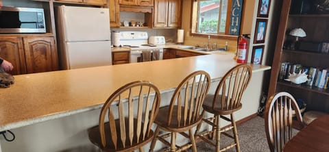 Breakfast bar with stools