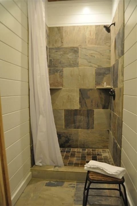 Stone showers add to the experience of being on the farm.