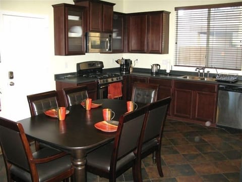 Fully equiped kitchen with Stainless steel appliances and gas stove,