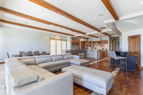 Great open floorplan with kitchen, dining area, and wet bar