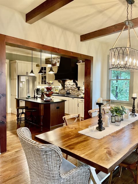 Dining table open to kitchen area.