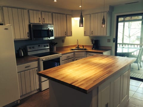 Kitchen with Sliding Door to Screened in Porch