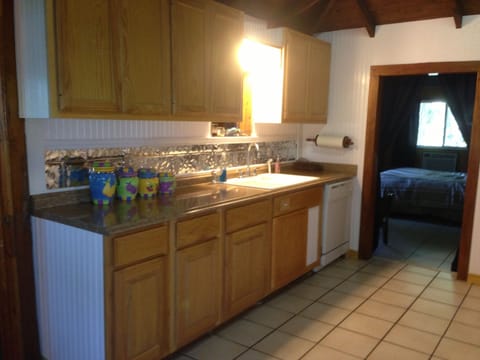 Kitchen with view of front bedroom