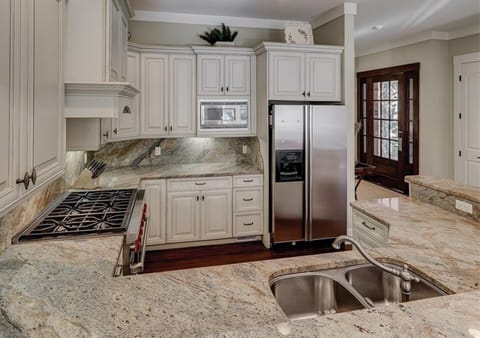 upscale appliances including  6 burner Wolf range.