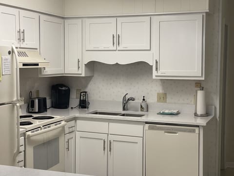 Kitchen with new cabinets and countertops.