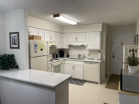 Kitchen with new cabinets and new stone countertops