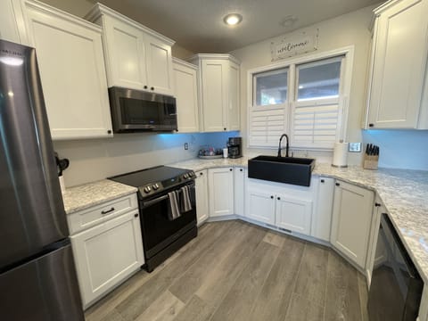 Refrigerator with dual ice and beverage center. 
