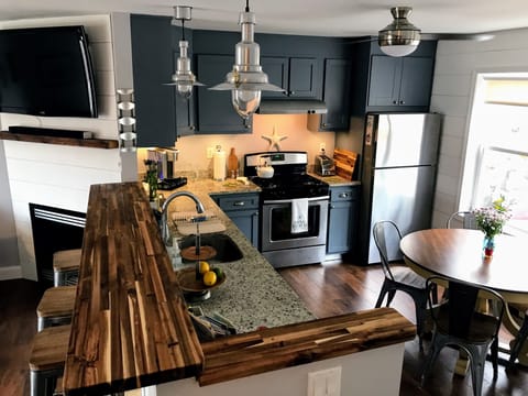 Fully stocked modern kitchen, with all the amenities.