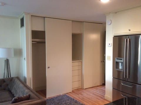 Generous storage. Two sliding-door closets flank a built-in 5-drawer dresser.