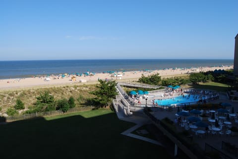 View of outdoor pool in front of the Edgewater House and the walk to the beach.