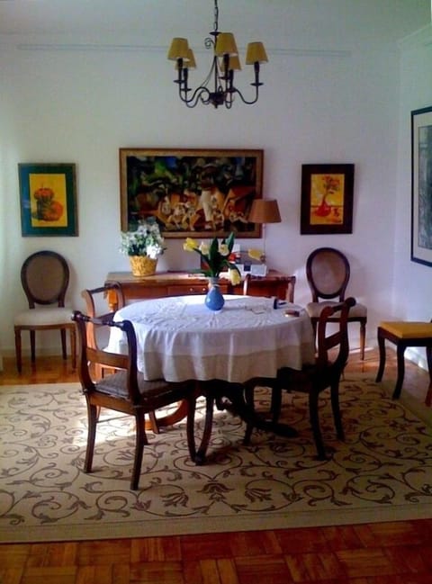 Dining room with art from the family.