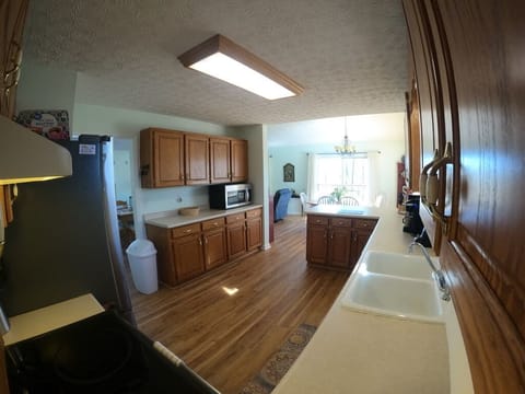 Another view of the kitchen. Tons of storage!!