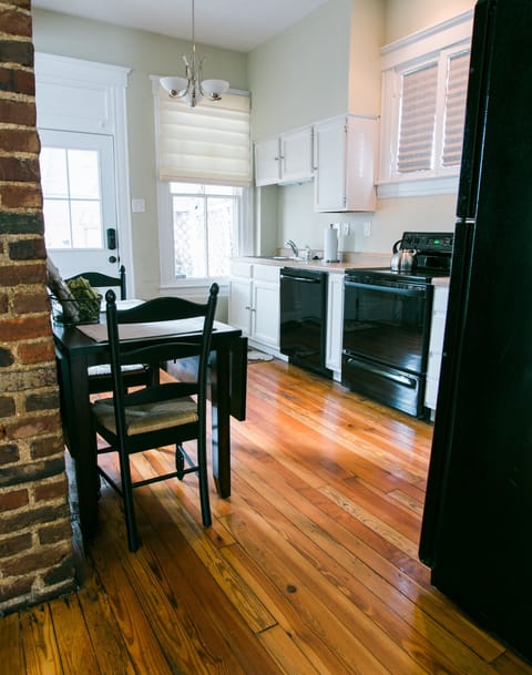 Open floor plan with living room and eat-in kitchen