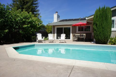Kitchen connects seamlessly to outdoor dining area and pool.