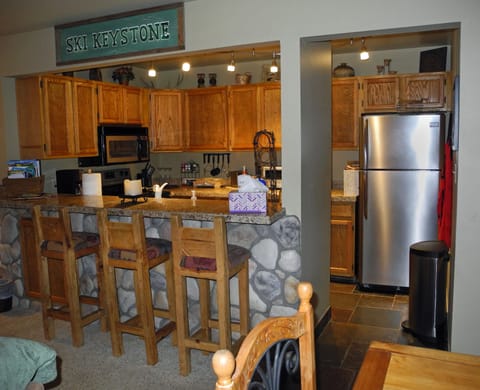 Kitchen with stainless steel appliances.