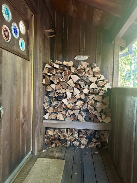 You’ll find dry firewood stacked in the entrance for the wood burning stove.