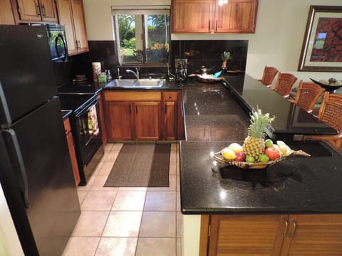 Kitchen with new granite and tile floors
