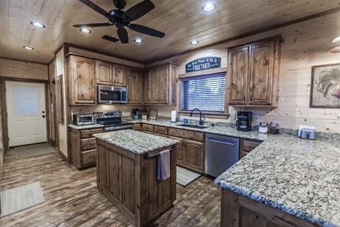 Customer Kitchen with Granite Counters, Island, and more.
