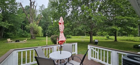 back deck, fire pit, BBQ grill, new lounging chairs avalable per guest request