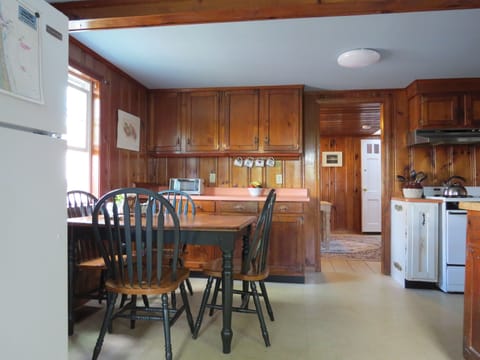 Eat-in kitchen. Can seat 6. View from back entrance.