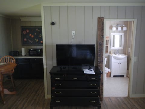 Chest of drawers for clothes storage if desired.