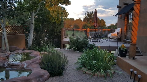 peaceful courtyard with running waterfall in warm months