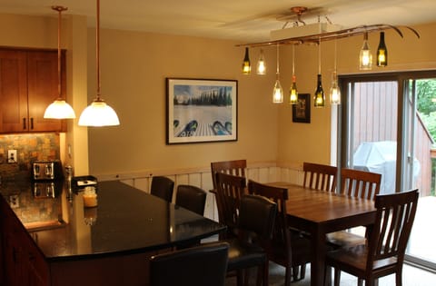 We love skiing and we love wine!  This custom built chandelier combines both!