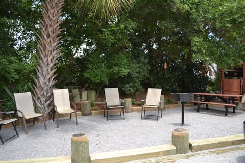 This grilling area is steps away from your condo. Great for happy hour!