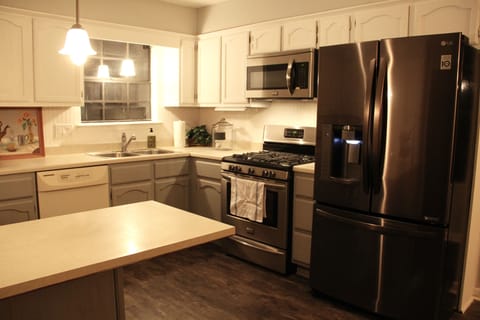 Frigidaire Gallery oven & microwave with black stainless LG fridge.