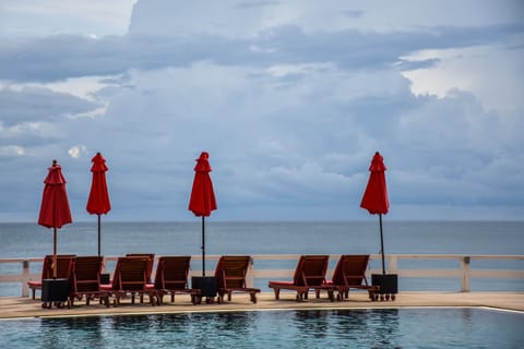 Seat by the pool over look the sea