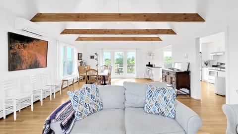 Cozy living room with dining area beyond