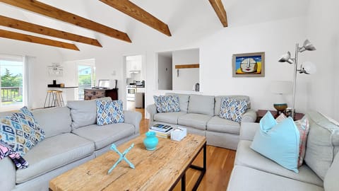 Cozy living room with dining area beyond