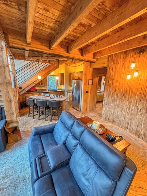 Enjoy the beautiful repurposed ceiling, custom designed kitchen and sitting area