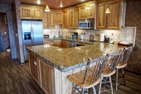 Double thick granite counters in the kitchen & bathrooms