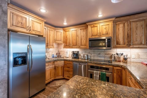Stainless steel appliances and beautiful cabinetry